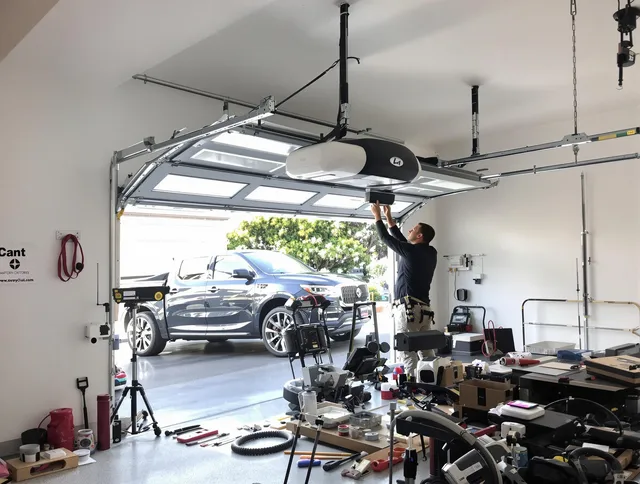 North Royalton Garage Door Repair specialist installing smart garage door opener system in North Royalton home