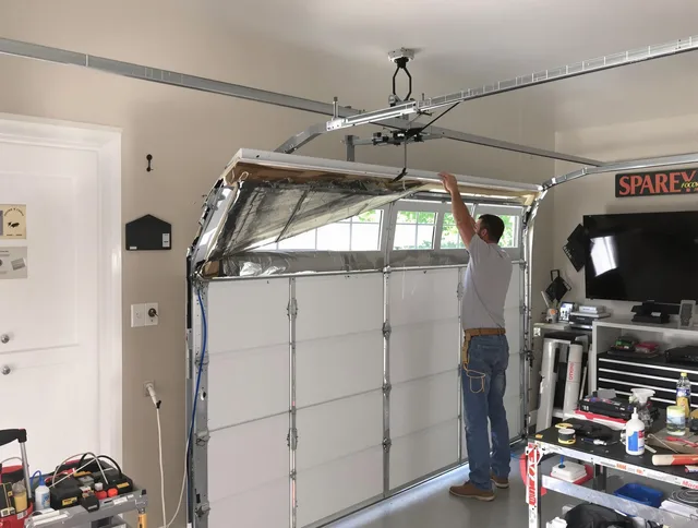 Garage door section replacement by North Royalton Garage Door Repair in North Royalton