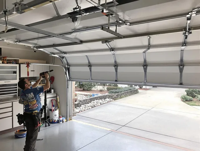 Garage door track repair service by North Royalton Garage Door Repair in North Royalton